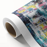 Abstract splattered canvas art in vibrant hues of blue, pink, and yellow, showcasing a modern artistic design, perfect for contemporary home decor.