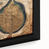 Close-up of framed canvas wall art featuring vibrant flowers and botanical leaves in a modern design, perfect for home decor. The artwork showcases intricate details and rich colors that enhance any space's aesthetic.