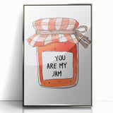 Mid-century modernist art depicting colorful geometric shapes on a silver-framed acrylic print.