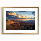 Landscape artwork of canyons framed in gold with a white mat, showcasing vibrant earthy tones and intricate details, perfect for enhancing modern home decor.