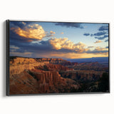 Framed canvas artwork depicting a scenic landscape of canyons in warm earth tones, featuring a sleek black frame and a side view that highlights its elegant design. Ideal for enhancing modern home decor with a touch of nature-inspired aesthetic.