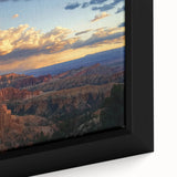 Close-up of a framed canvas depicting a vibrant landscape of canyons, showcasing rich earth tones and intricate details, ideal for home decor.