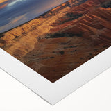 Landscape canvas art showcasing vibrant canyons in rich earthy tones, rolled and ready for display, ideal for adding a touch of natural beauty to home decor.