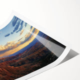 Stunning landscape canyon rolled print showcasing vibrant hues of orange and blue, featuring intricate rock formations, ideal for home decor and nature enthusiasts.