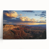 Stretched canvas artwork showcasing a vibrant landscape of canyons in warm earth tones, ideal for enhancing home decor with a nature-inspired aesthetic.