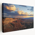 Stretched canvas artwork depicting a stunning landscape of canyons, showcasing rich earthy tones and intricate details, perfect for enhancing home decor.
