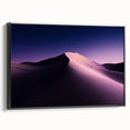 Framed canvas artwork depicting a serene desert landscape with vibrant colors, showcasing mountains and cacti, presented in a sleek black frame for elegant decor.