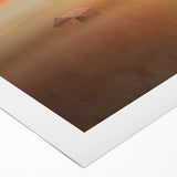 Vibrant rolled canvas artwork depicting a serene landscape with lush green fields under a clear blue sky, elegantly packaged in a durable cardboard tube for safe shipping.