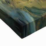 Close-up of a stretched canvas showcasing a vibrant landscape design with rich colors and intricate details, ideal for home decor and artistic displays.