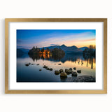 Abstract art print of Cumbria landscape in muted green and brown tones, framed in gold, ideal for dining room decor.