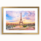 Abstract art print of Paris scenery in muted gold and blue tones, framed with mat, suitable for dining room decor.