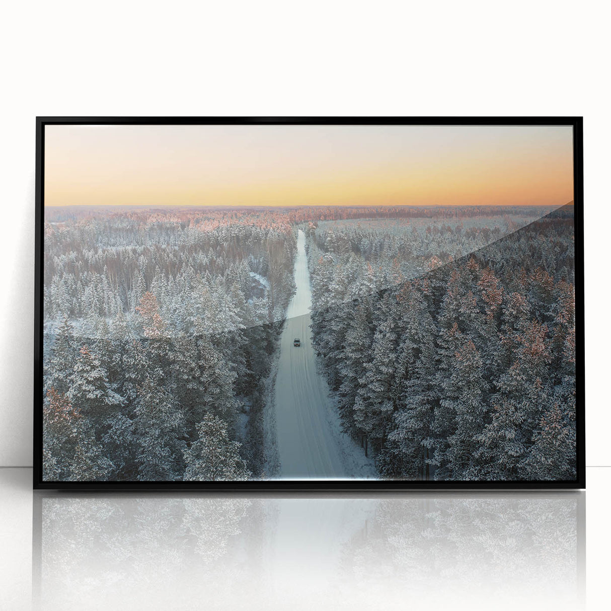 Large abstract wall art depicting a European landscape in muted tones, framed in black acrylic.