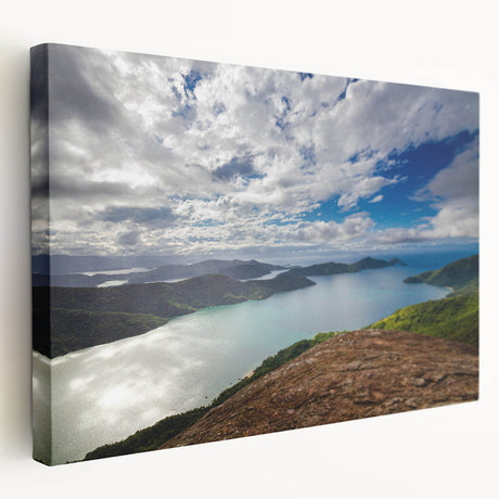 Side view of a large stretched canvas featuring a vibrant, abstract depiction of a Brazilian landscape.