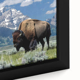 Extra large framed canvas of the Grand Tetons with a textured black foreground and colorful sunset background.