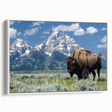 Vintage poster art of the Grand Tetons in colorful hues on a framed canvas, ideal for living room decor.