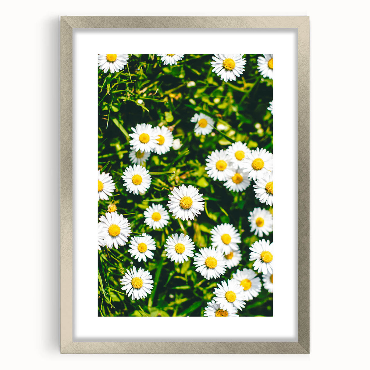 Textured abstract art print in muted green and blue tones, framed in silver, ideal for bedroom wall decor.