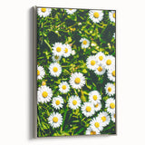 Landscape art painting depicting spring with vibrant green and floral accents on a framed canvas.