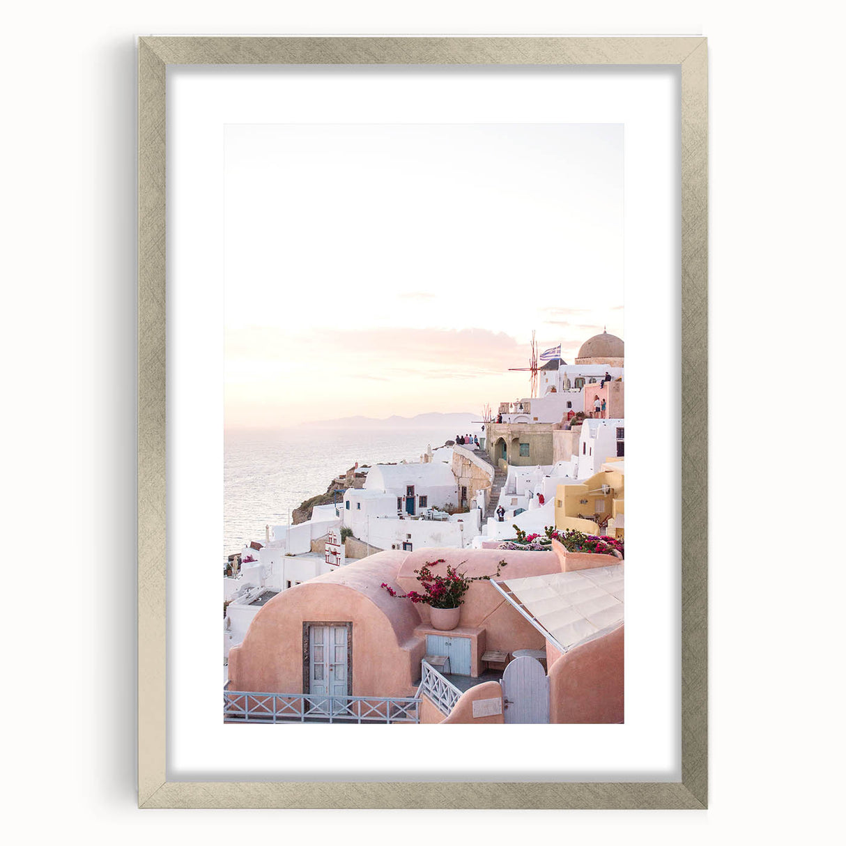 Abstract textured art print in silver frame, featuring swirls in muted gray and blue tones.