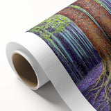 Rolled canvas artwork showcasing vibrant abstract floral designs in shades of blue, pink, and yellow, ideal for modern home decor, presented in a protective cardboard tube.