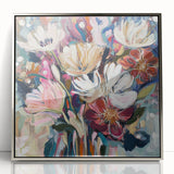 Framed acrylic artwork featuring an abstract floral design in vibrant colors, set in a sleek silver frame, perfect for modern home decor.