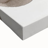 Close-up of an abstract minimalist wall art piece on stretched canvas, showcasing soft pastel colors and organic shapes, ideal for modern home decor.