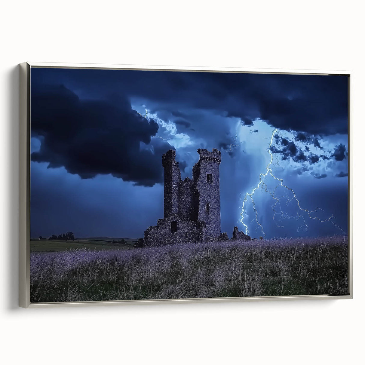 Framed canvas artwork depicting a serene landscape with a majestic castle, set against a vibrant blue sky, featuring a stylish silver frame that enhances its elegance. Ideal for home decor and art enthusiasts, this piece adds a touch of sophistication to any room.