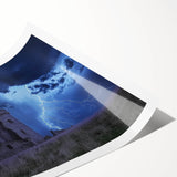 Rolled print showcasing a stunning landscape with a majestic castle, featuring rich colors and intricate details, packaged securely in a cardboard tube for preservation.