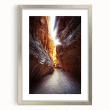 Silver-framed landscape artwork depicting a serene cave scene, elegantly matted for enhanced presentation. Ideal for home decor or office aesthetics.