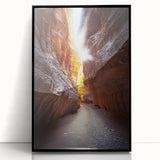 Framed acrylic artwork depicting a serene landscape with intricate cave formations, showcasing vibrant colors and modern black frame, perfect for home decor.