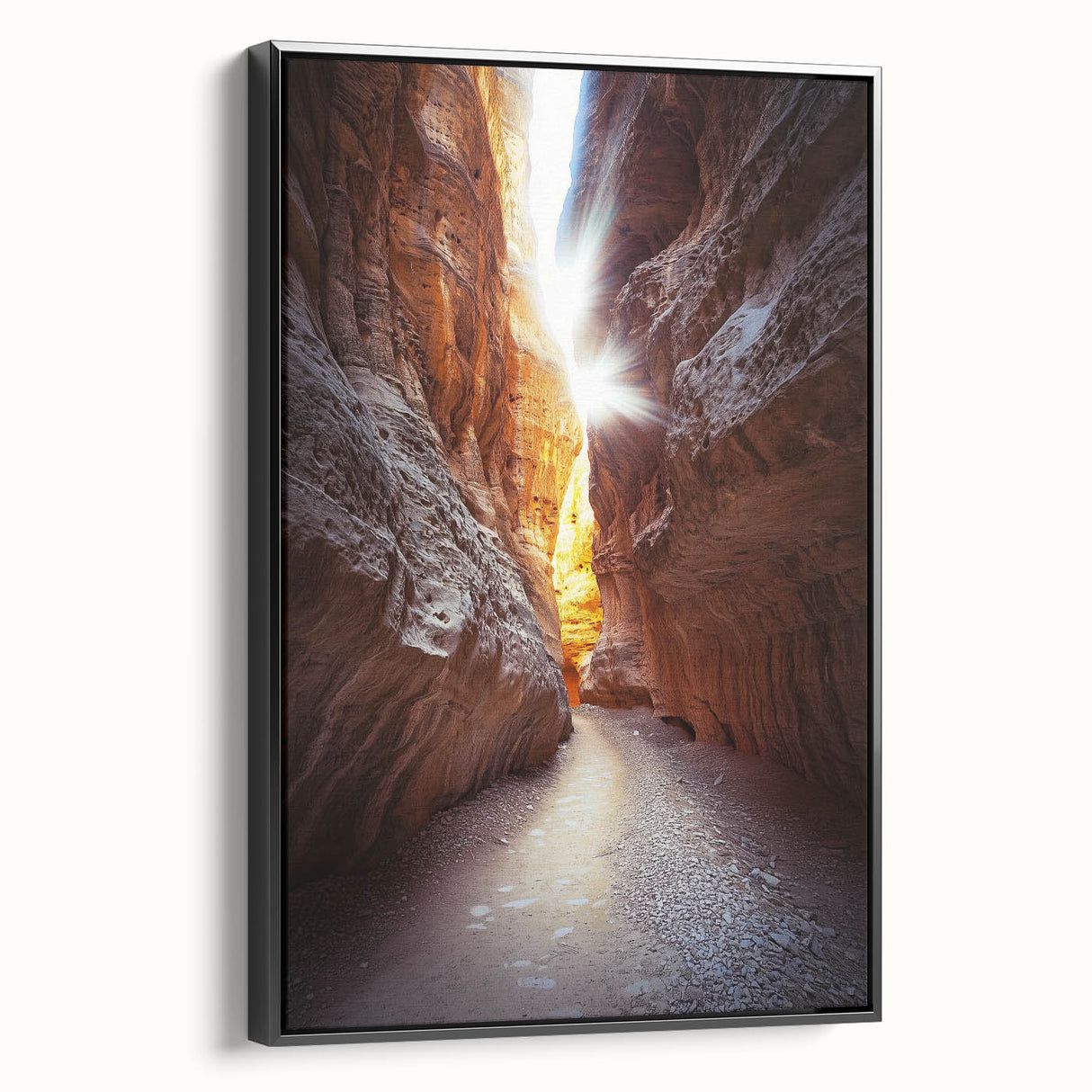 Framed black canvas artwork depicting a stunning landscape with intricate cave formations, enhancing interior decor with a modern aesthetic and natural colors.