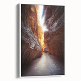 Framed canvas artwork showcasing a stunning landscape with caves, featuring earthy tones and intricate details, displayed against a white background for a modern aesthetic. Ideal for enhancing home decor with a touch of nature and adventure.