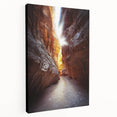 Stretched canvas artwork showcasing a captivating landscape scene with intricate cave formations, rich earthy tones, and detailed textures, perfect for home décor.