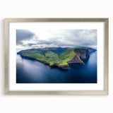 Silver-framed landscape artwork depicting majestic cliffs, elegantly matted for a refined look, ideal for home decor or office enhancement. Perfect for nature lovers.