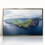 Framed acrylic artwork showcasing a stunning landscape of cliffs at sunset, featuring rich gold accents and a modern design, perfect for home decor.