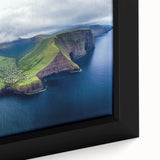 Close-up of a framed canvas showcasing a vibrant landscape with towering cliffs, rich colors, and intricate details, perfect for enhancing home decor.