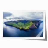 Stunning landscape print showcasing dramatic cliffs and vibrant blue skies, rolled and packaged securely in a protective tube for easy transportation and display.