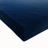 Close-up of a vibrant stretched canvas depicting stunning cliff landscapes, showcasing intricate details and rich colors, perfect for home decor enthusiasts.