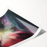 Colorful abstract splatter art print showcasing vibrant hues of blue, red, and yellow, rolled and ready for display, perfect for modern home decor.