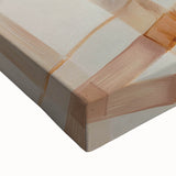 Close-up of large art featuring black and white landscape painting of pastries, ideal for bedroom wall decor.