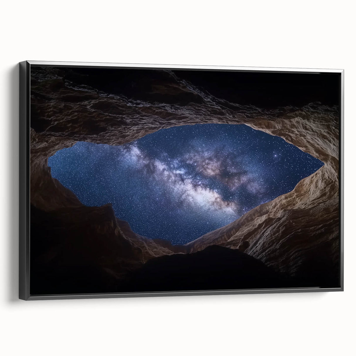 Framed canvas art showcasing a stunning landscape of canyons in rich earth tones, featuring a sleek black frame, ideal for enhancing modern home decor.