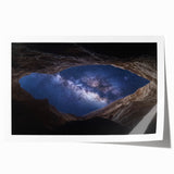 Vibrant landscape print showcasing expansive canyons in warm earth tones, rolled and ready for display, emphasizing natural beauty and artistic craftsmanship.