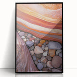 Framed acrylic artwork depicting a serene desert landscape with vibrant colors and intricate details, showcasing a black frame for a modern touch.