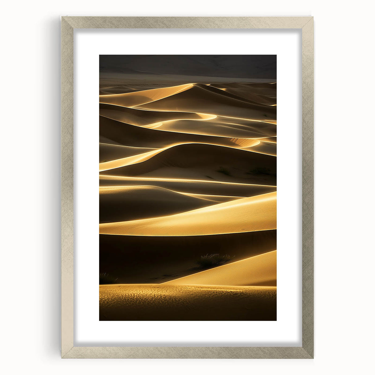 Framed landscape artwork depicting serene sand dunes in soft earth tones, surrounded by a silver mat and frame, ideal for enhancing home decor aesthetics.