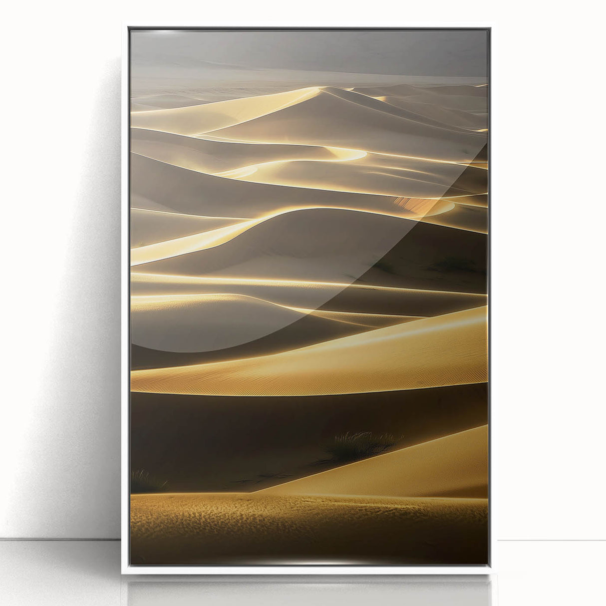 Framed acrylic artwork depicting serene desert dunes in soft beige and golden hues, highlighting the beauty of nature in a modern white frame, perfect for home decor.