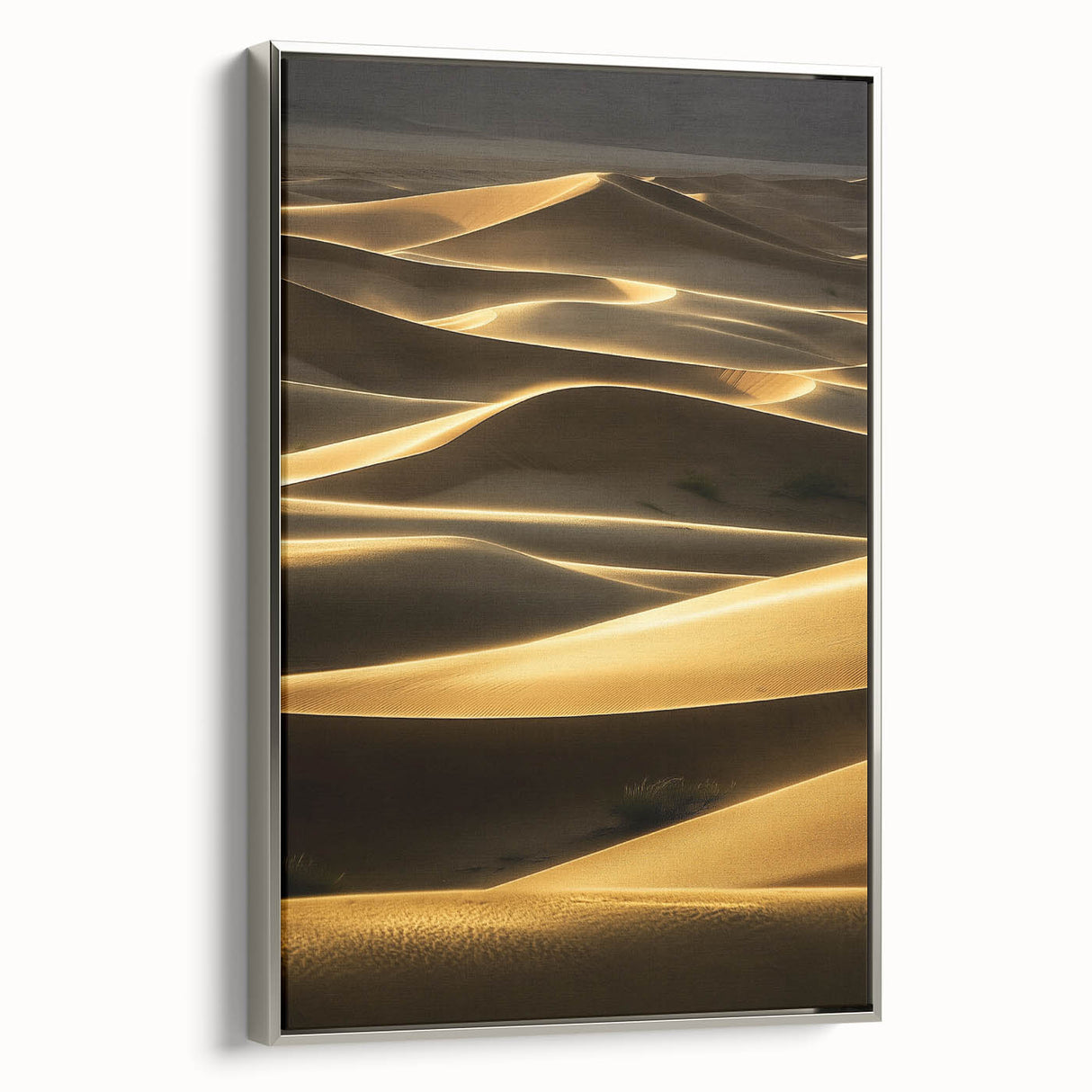 Framed canvas print depicting serene landscapes of sand dunes, featuring a silver frame that enhances the artwork's elegant design, ideal for modern home decor.