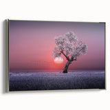 Framed canvas print showcasing a serene landscape with lush green fields and a soft blue sky, elegantly displayed from the side with a silver frame. Ideal for home decor.