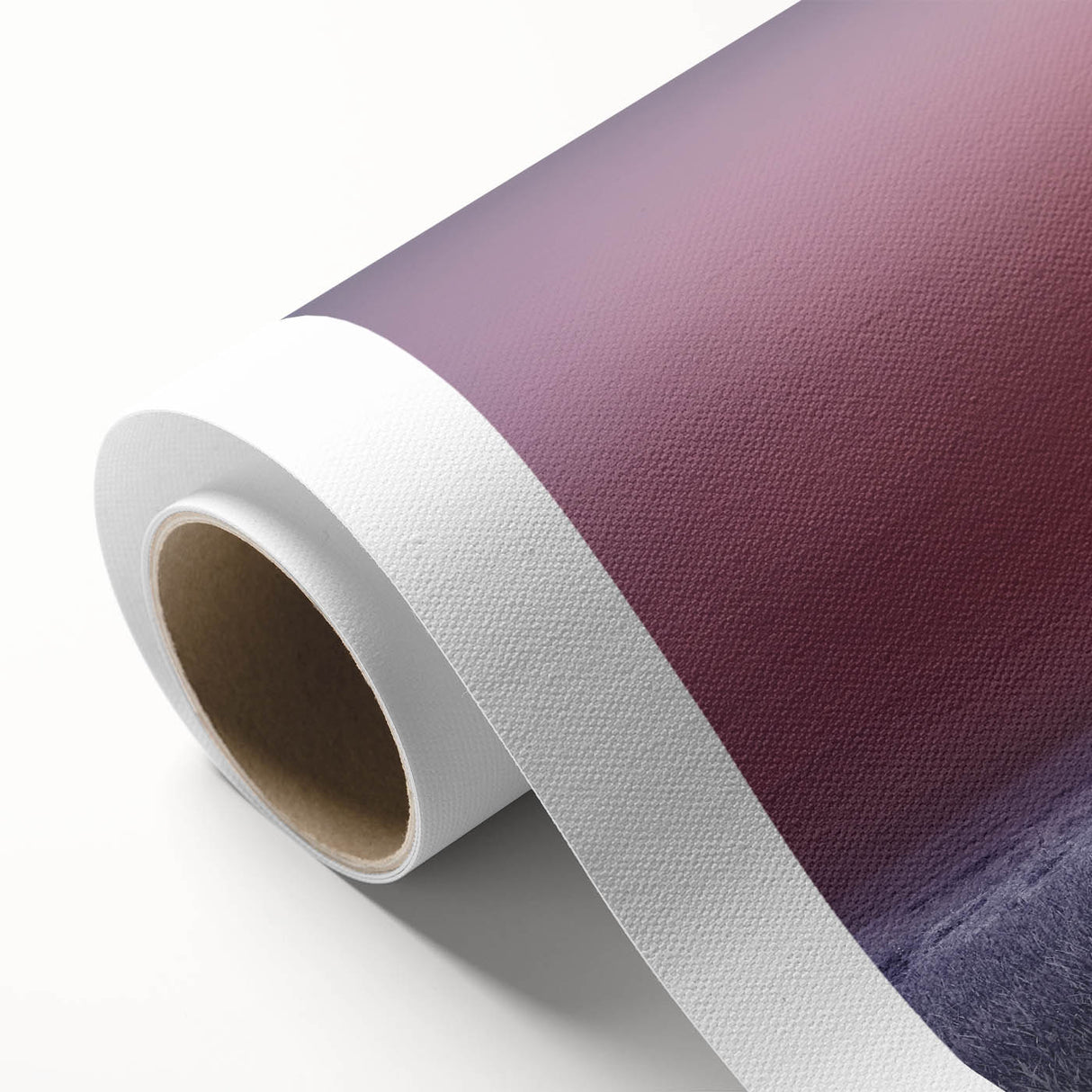 Rolled canvas artwork showcasing a vibrant landscape scene with lush green fields under a clear blue sky, elegantly packaged in a protective cardboard tube for safe shipping.