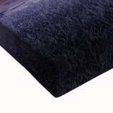 Close-up of a vibrant stretched canvas print showcasing a serene landscape with rolling fields and a clear blue sky, ideal for home decor and art enthusiasts.