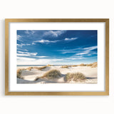 Abstract art print of a European landscape in muted green and blue tones, framed with a gold mat.