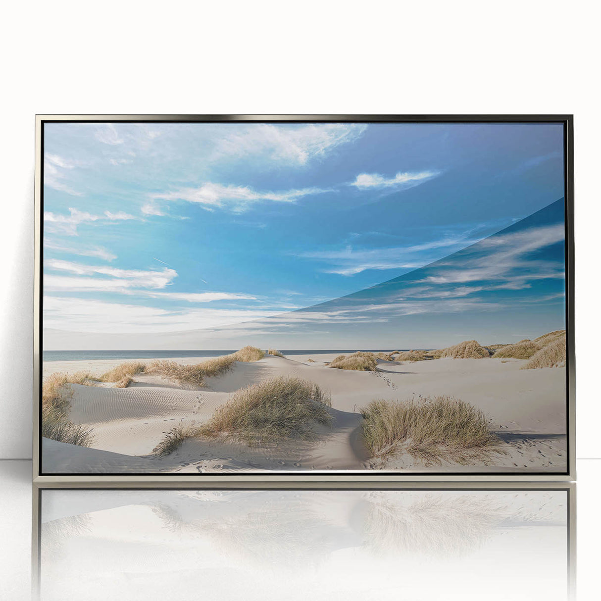 Large art print of a European Danish scenery in muted earth tones on a silver-framed acrylic.
